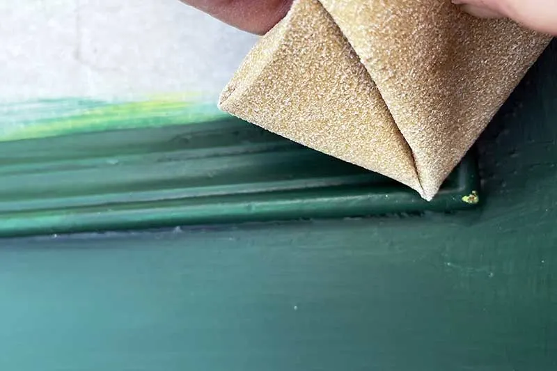 Chipping paint on upcycled Christmas picture frame
